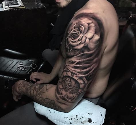 This tribal half sleeve tattoo for women depicts a fierce feminine vibe that makes it a great option for female tribal fans. Rose & Clock Mens Half Sleeve | Best tattoo design ideas