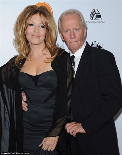 Use your privilege for good. Crocodile Dundee's Paul Hogan cosies up to wife and co ...
