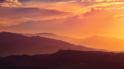 Sunset 4k Wallpaper Mountain Range Silhouette Landscape Orange Sky