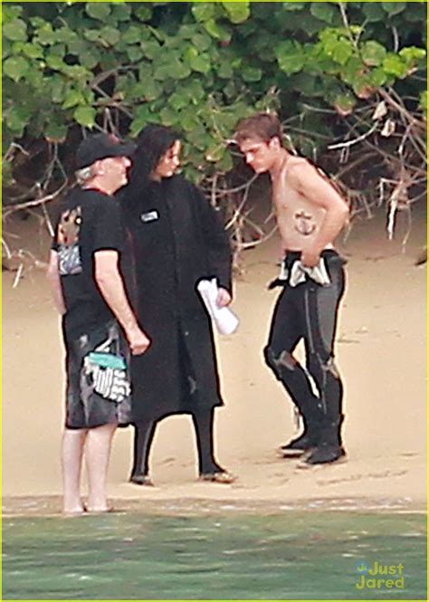 Josh Hutcherson Shirtless In The Sand With Jennifer Lawrence Photo