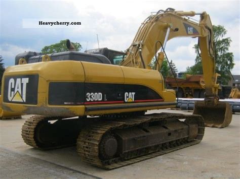 Cat® 330 hydraulic trackhoe excavators offer the ideal balance of control, digging, trenching, and lifting capacity all at lower hourly operating costs. CAT 330DL 2006 Caterpillar digger Construction Equipment ...