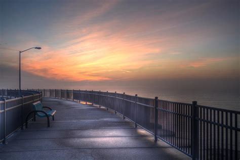 Early Morning Walk On Luna Pier Photograph By Mike Guhl Fine Art America