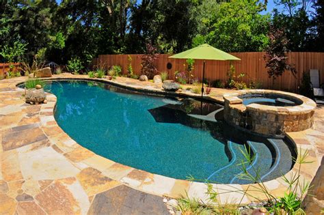 Natural Pool With Flagstone Coping And Patio Rustic San