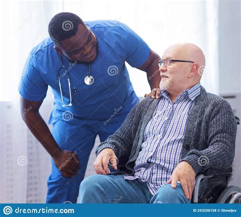 Professional Doctor Helps An Elderly Man With Chronic Diseases