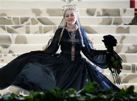 Fashion and the catholic imagination at the met now. Madonna Photos Photos - Heavenly Bodies: Fashion & The ...