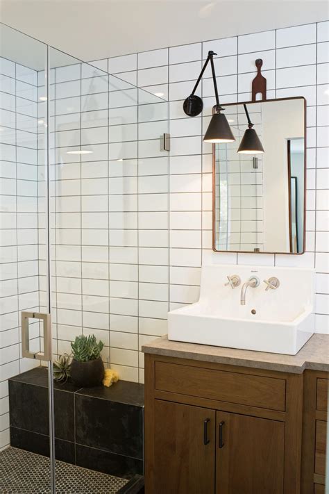 The crystallized essence of magical powers extracted from monsters. Transitional Bathroom With Black & White Tile Shower | HGTV