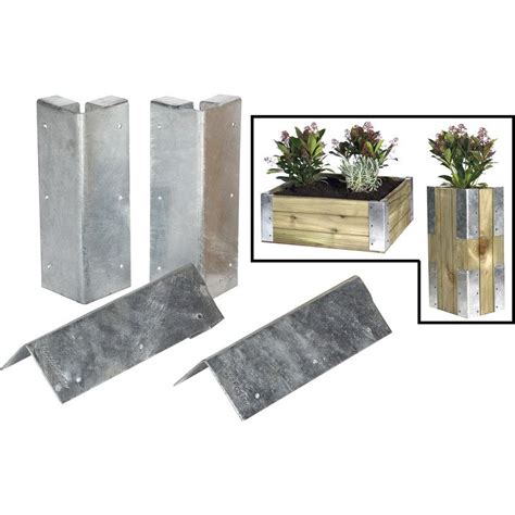 Hammer rebar a few inches deep a foot from each corner of the short sides and remove the temporary supports. Raised Bed Bracket Kit | Garden flower beds, Metal raised garden beds, Garden beds