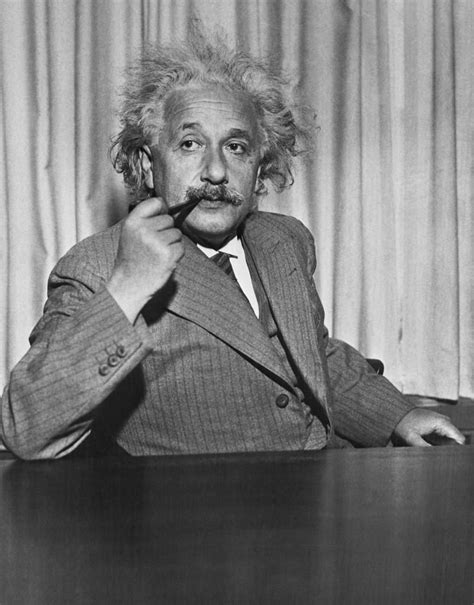 Albert Einstein Smoking A Pipe