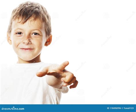 Little Cute Boy Pointing In Studio Isolated Close Up Stock Photo