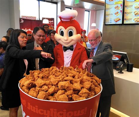 Chickenjoy with palabok family pan ₱699: First Jollibee cloud kitchen opens in Chicago with ...