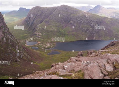 A View Looking Down From Ben More Coigach Scotland On The Surrounding