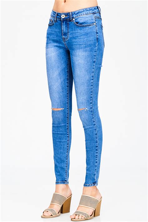 Shop Medium Blue Washed Denim Mid Rise Distressed Ripped Knee Fitted Skinny Jeans
