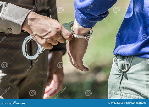 Police Helped To Catch The Guilty And Lock The Handcuffsarrested Stock