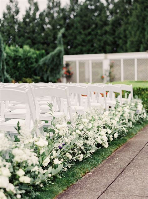 Elegant Aisle Decorations With White Flowers And Leaves Outdoor