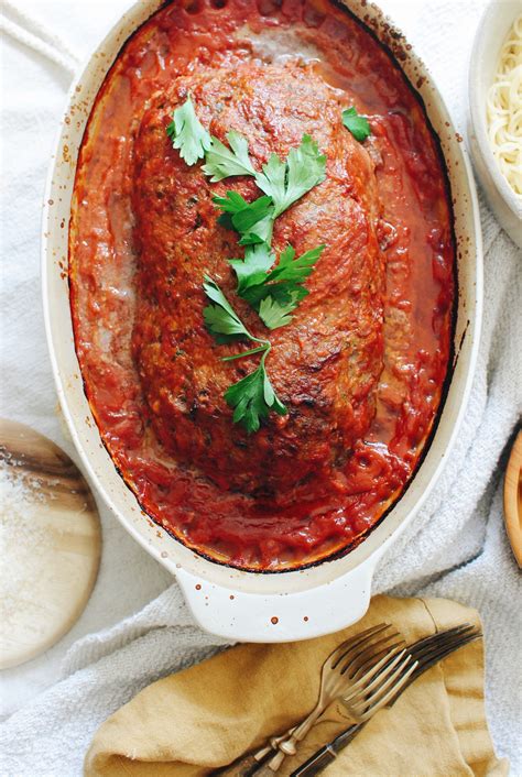 Start with two pounds of ground beef in a large mixing bowl. The Best Meatloaf in a Tomato Sauce | Bev Cooks