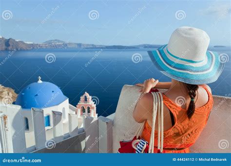 Happy Tourist Woman On Santorini Island Greece Travel Stock Photo