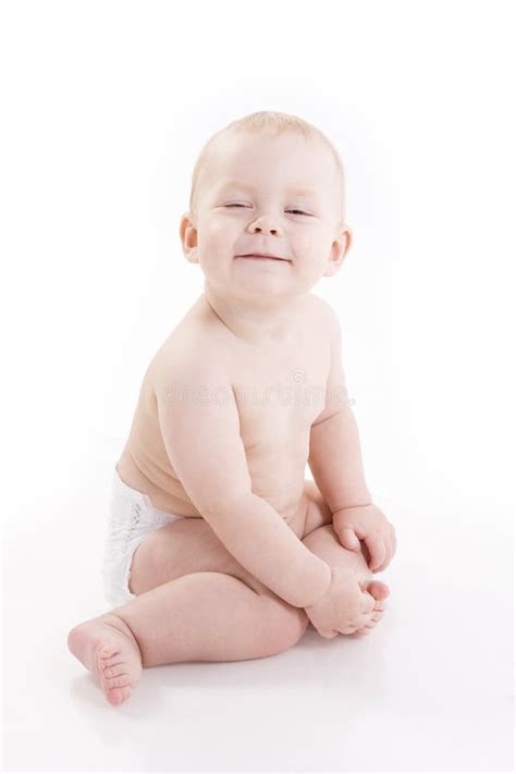 Smiling Baby Boy In A Diaper Sitting On The Floor Stock Photo Image