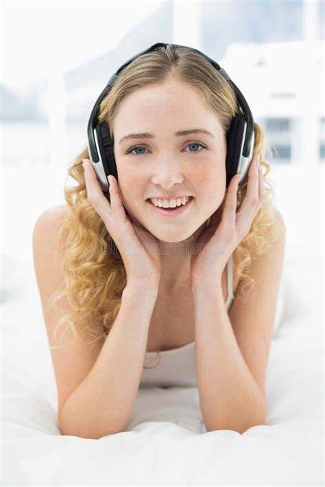 Pretty Cheerful Blonde Lying Bed Listening To Music Stock Photos Free