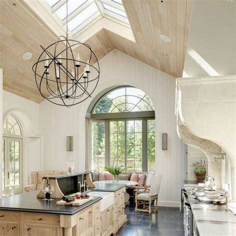 The vaulted ceiling of this country french kitchen allows space to showcase the room's charming accents. Inspiring vaulted ceiling ideas in interior design - types ...