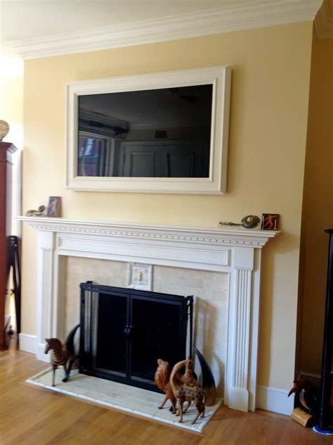 We planked the wall above the mantel and added picture frame and crown molding to finish it off. Surprising tv above fireplace component storage that will ...