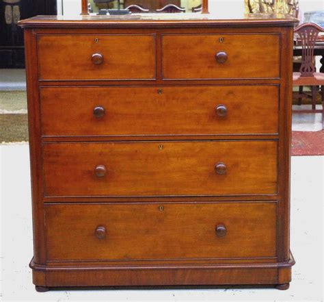 The drawer fronts are made up of small sections of different wood malm is cheap enough to have a couple side by side if you want to create a long run of storage and because it's one. Victorian mahogany chest of drawers with 2 short and 3 ...