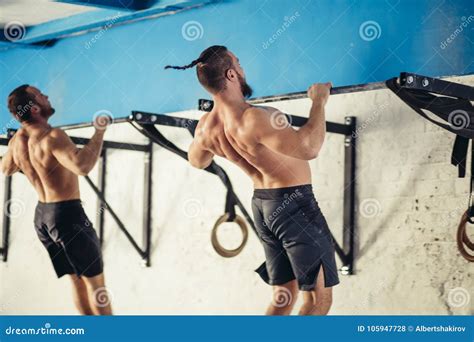 Two Fitness Toes To Bar Men Pull Ups Tree Bars Workout Exercise At Gym