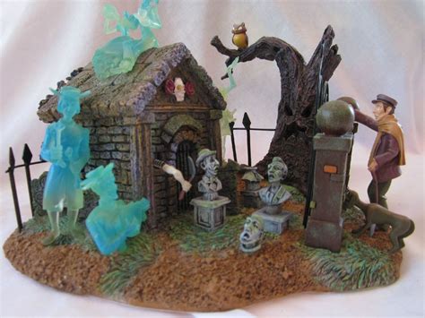 Now what if we say haunted. Disney rare haunted mansion house light up graveyard 28182 ...