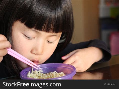 Asian Girl Eating Noodles Free Stock Images And Photos 12218191