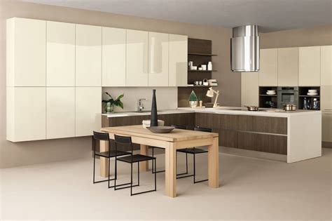 Por otro lado, el diseño de cocinas modernas y elegantes lo podéis conseguir también con un suelo de madera y unas apredes y muebles blancos. Cocinas modernas - Rooms de Cocinobra