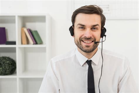 Portrait Of Male Call Center Agent Free Photo