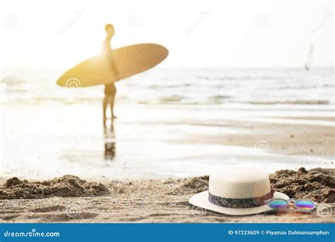 Man With Surfboard On The Beach At Sunset Stock Image Image Of Sand