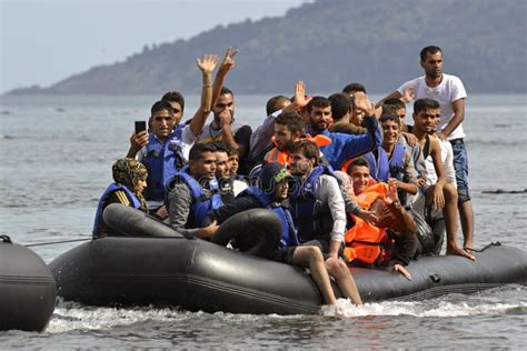Lesvos Greece October 12 2015 Refugees Arriving In Greece In Dingy