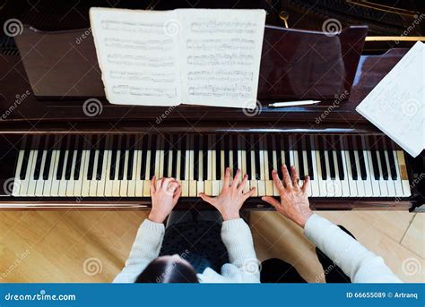 Piano Lessons At A Music School Teacher And Student Stock Image