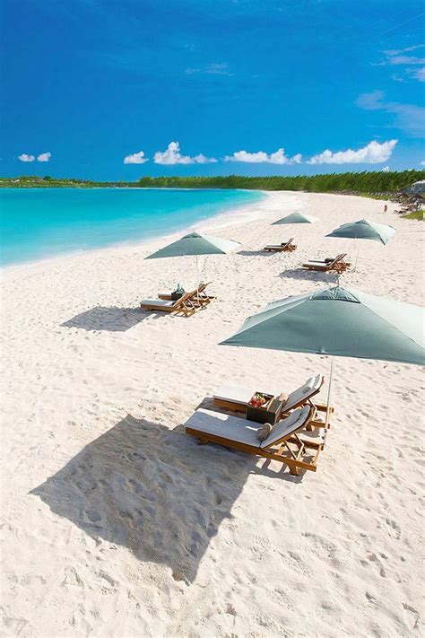 Sun Loungers On The Secluded Beach At Sandals Emerald Bay Bahamas