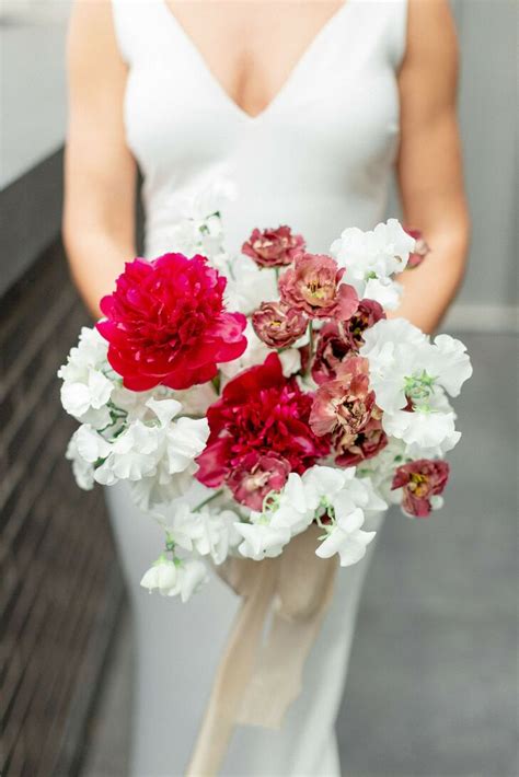 Wedding Bouquet With Peonies Lisiantus And Sweet Peas