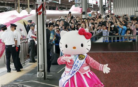 all aboard hello kitty pink bullet train debuts in japan daily mail online