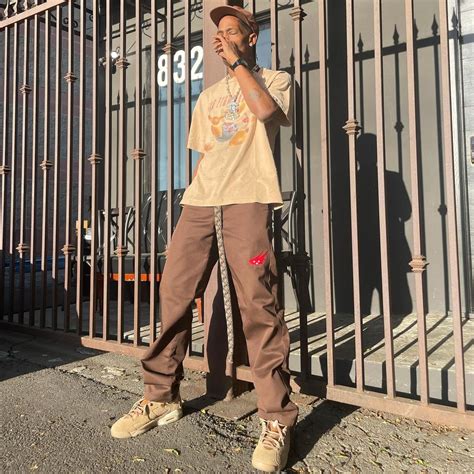 Spotted Travis Scott Spotlights His Latest All Brown Getup Pause