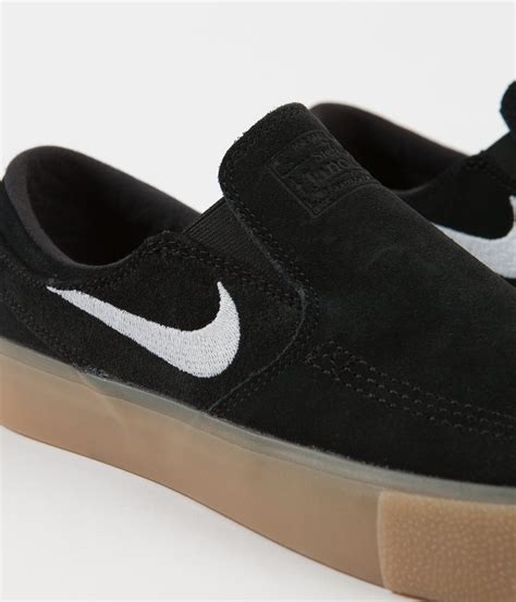 Nike sb zoom janoski ht slip trainers slip on leather uk size 8 (eur 42.5) white. Nike SB Janoski Slip On Remastered Shoes - Black / White ...