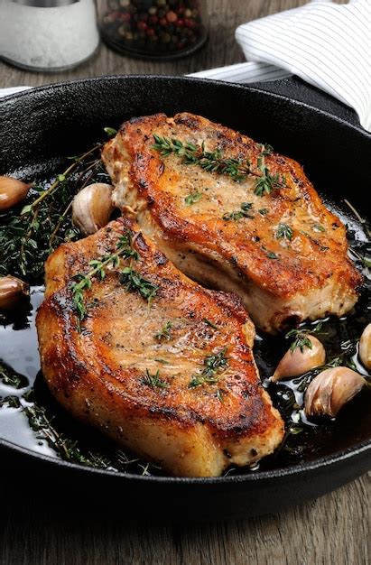 Premium Photo Roasted Pork Steak In Frying Pan