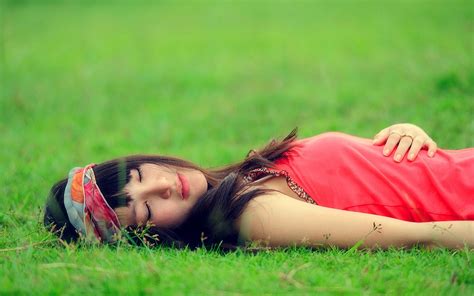 Girl Lying On The Grass Wallpapers And Images Wallpapers Pictures Photos