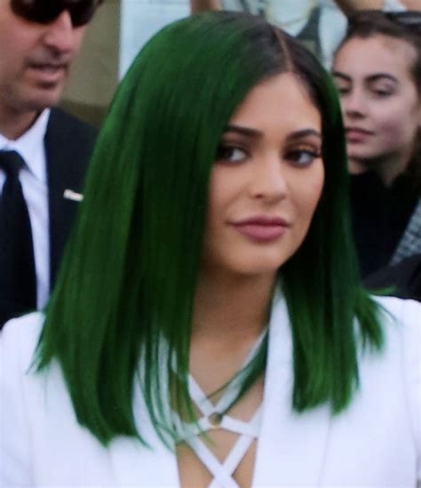 Kylie Jenner Debuts Kylie Lip Kit And Green Hair In Olcay Gulsen Coat