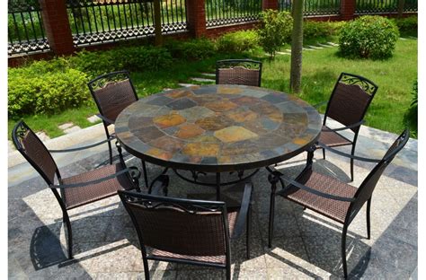 Exceptional craftsmanship and durable quality ensure your chairs stay looking their best for several seasons to come. 63'' Round Slate Outdoor Patio Dining Table Stone OCEANE