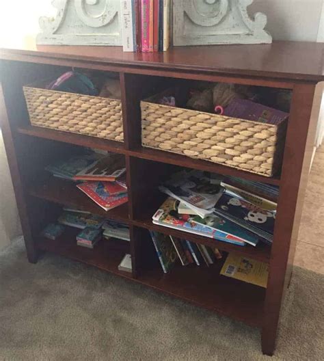 Since i used the annie sloan chalk paint on the entertainment center makeover, of course i had to use it on the side bookcases. How to refurbish a faux wood bookcase with Chalk Spray Paint
