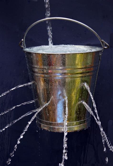 Leaky Bucket A Bucket With Holes Being Filled But With The Water
