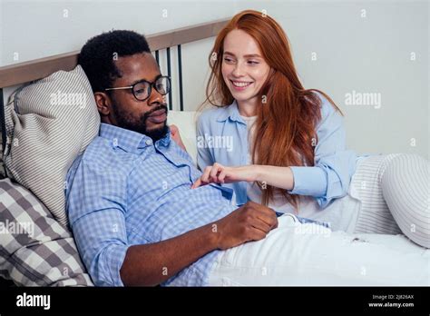 Redhaired Ginger Caucasian Happy Female And Multi Ethnic Afro Man