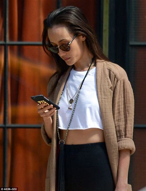 Maggie Q Shows Off Her Toned And Trim Tummy As She Waits For A Cab In