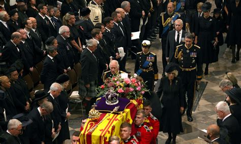 queen s funeral procession william harry more walk behind coffin