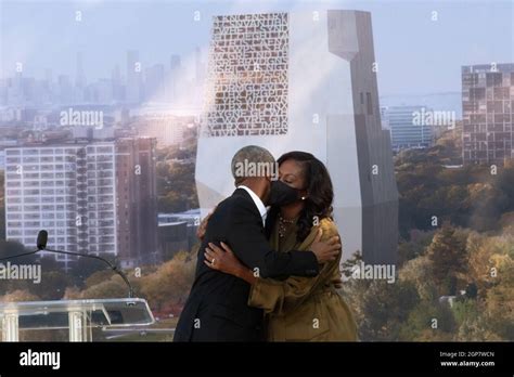 Former Us President Barack Obama Embraces Former First Lady Michelle