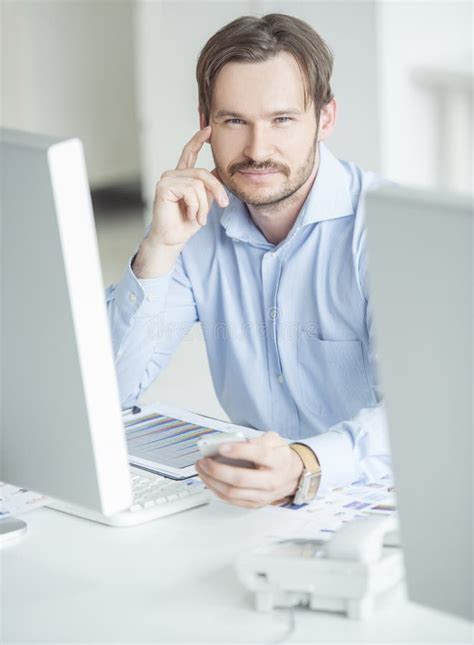 Businessman Sitting In Front Of Computer Monitors Stock Image Image