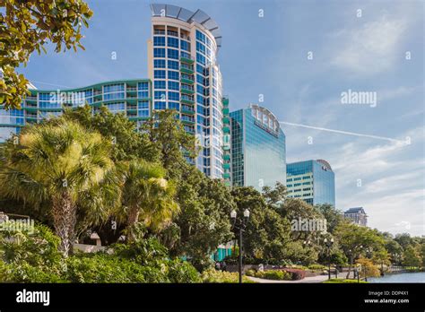 High Rise Buildings Along The Bank Of Lake Eola In Downtown Orlando